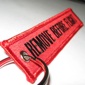 Remove Before Flight Keychain - Red/Black