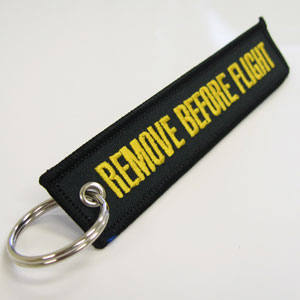 Remove Before Flight Keychain - Black/Yellow