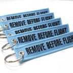 Remove Before Flight Keychain - Light Blue/Black 5pcs
