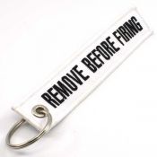 Remove Before Firing Keychain - White/Black